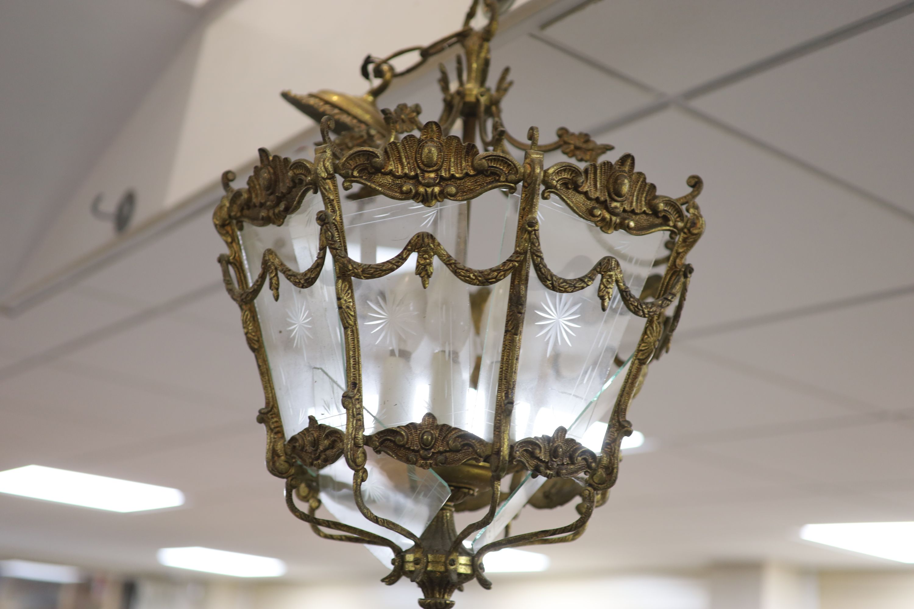 A Victorian gilt metal eight glass panelled hall lantern